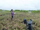 woman standing in open clearing