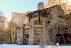 Exterior view of a stone hotel in Yosemite