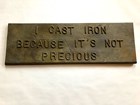 Cast iron plaque with the words 