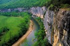 A sandstone bluff towers over a long bend in the Buffalo River.