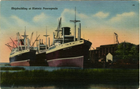 Postcard of two ships docked against a lightening sky