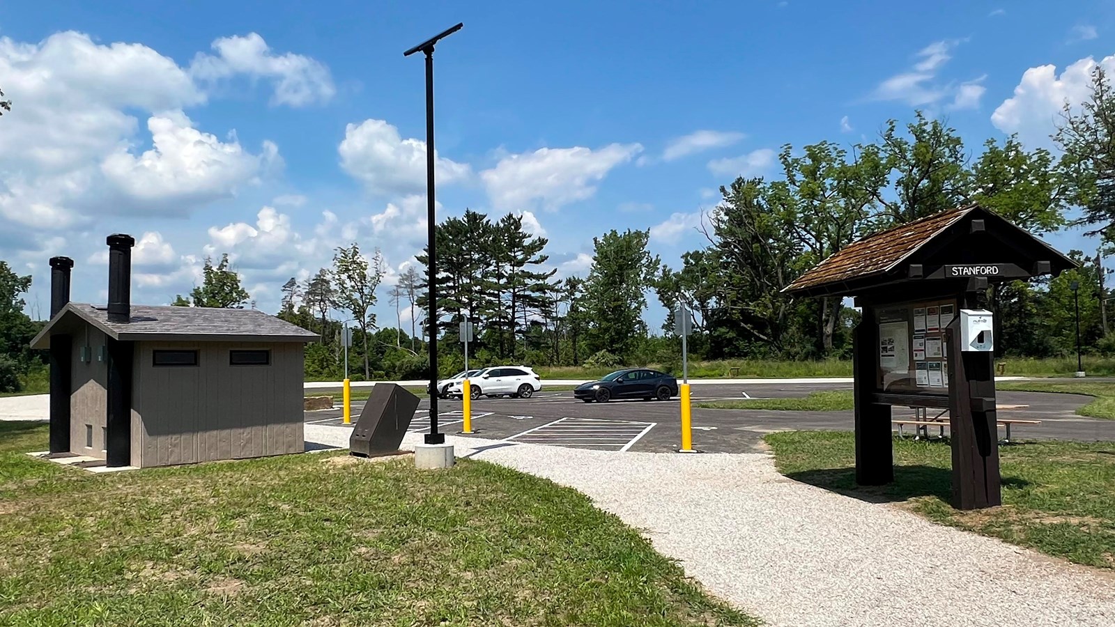 Wooden kiosk labeled 