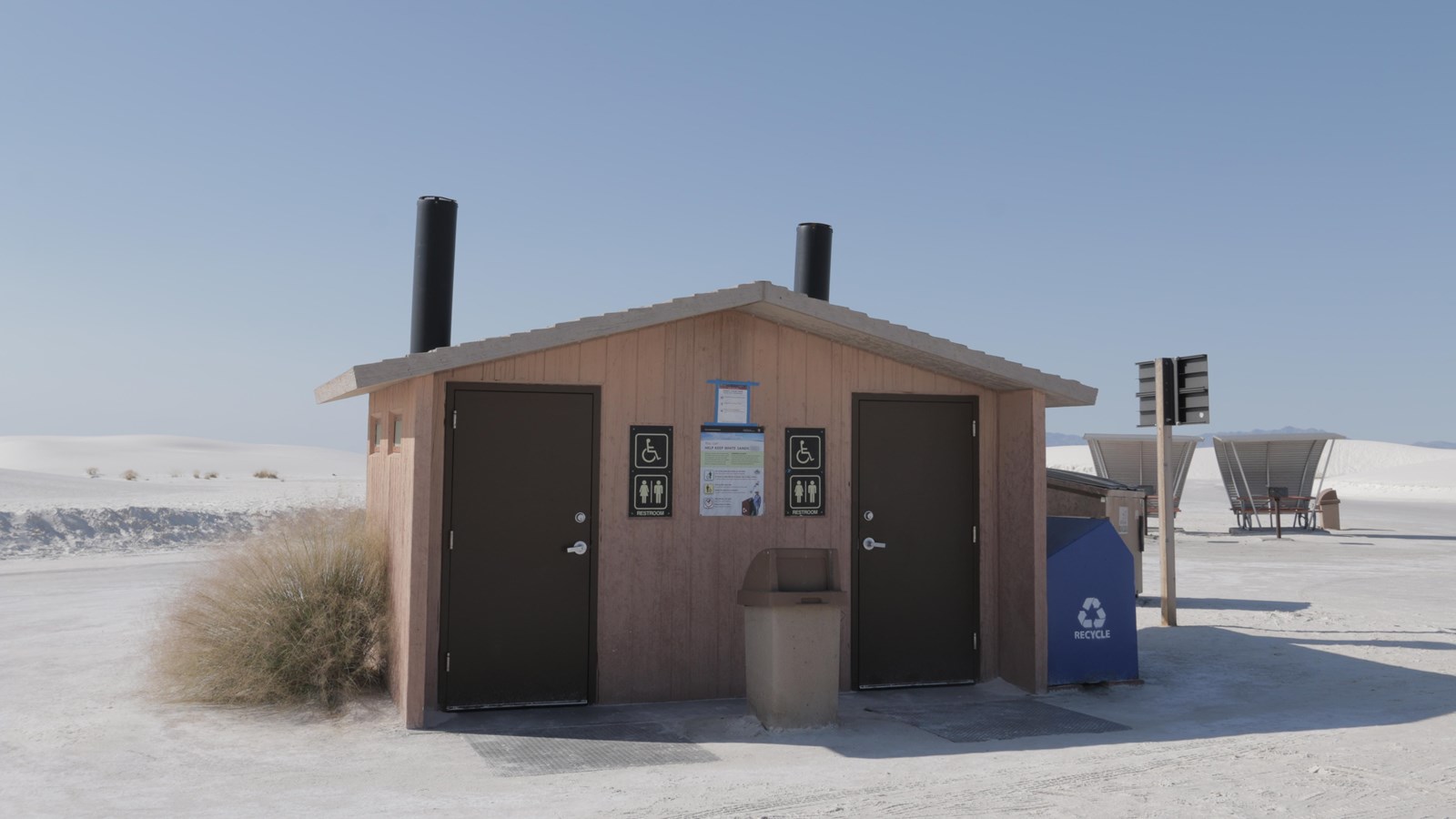 The Primrose Picnic Area restroom, located near several picnic tables.