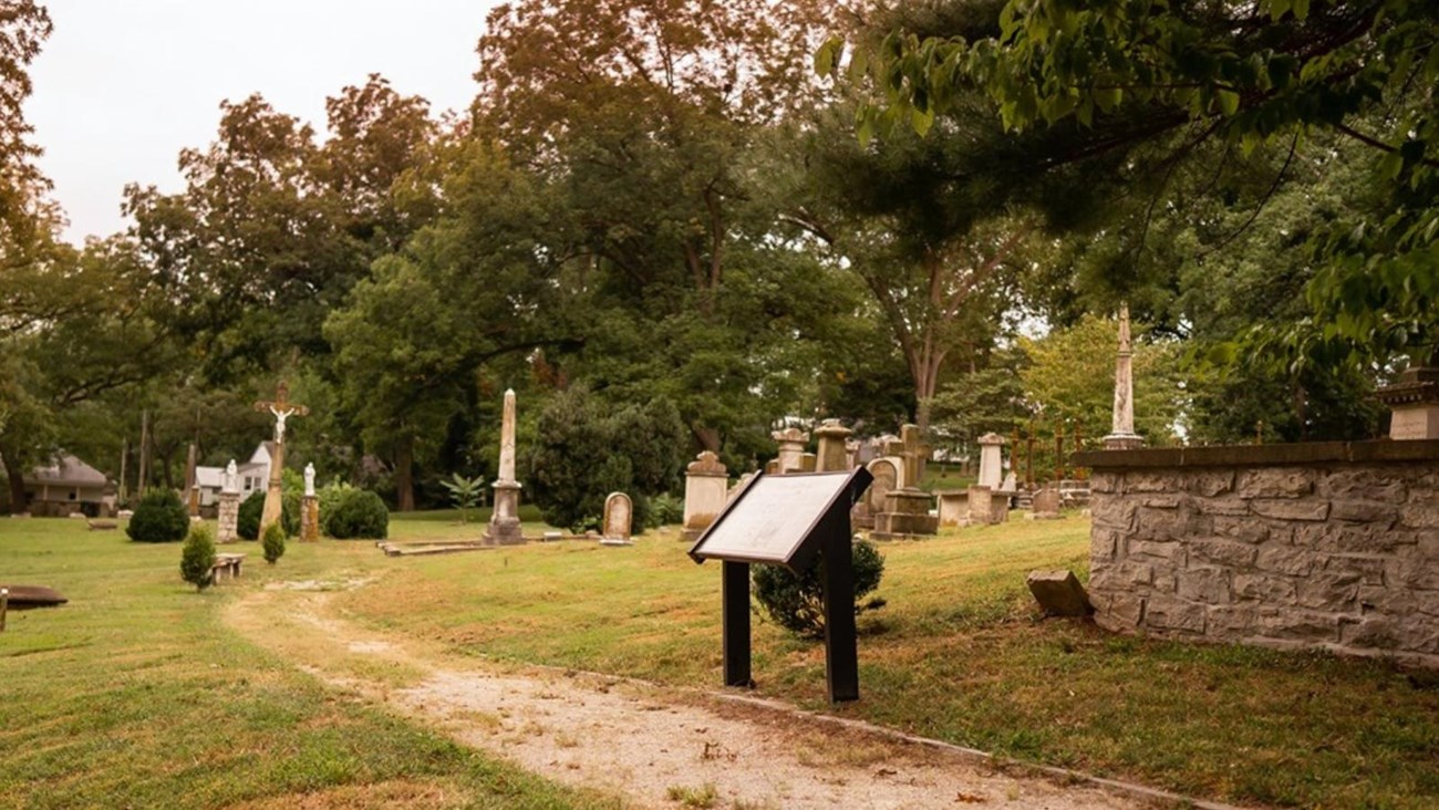 A modern photograph of a cemetery with a slight sepia tone