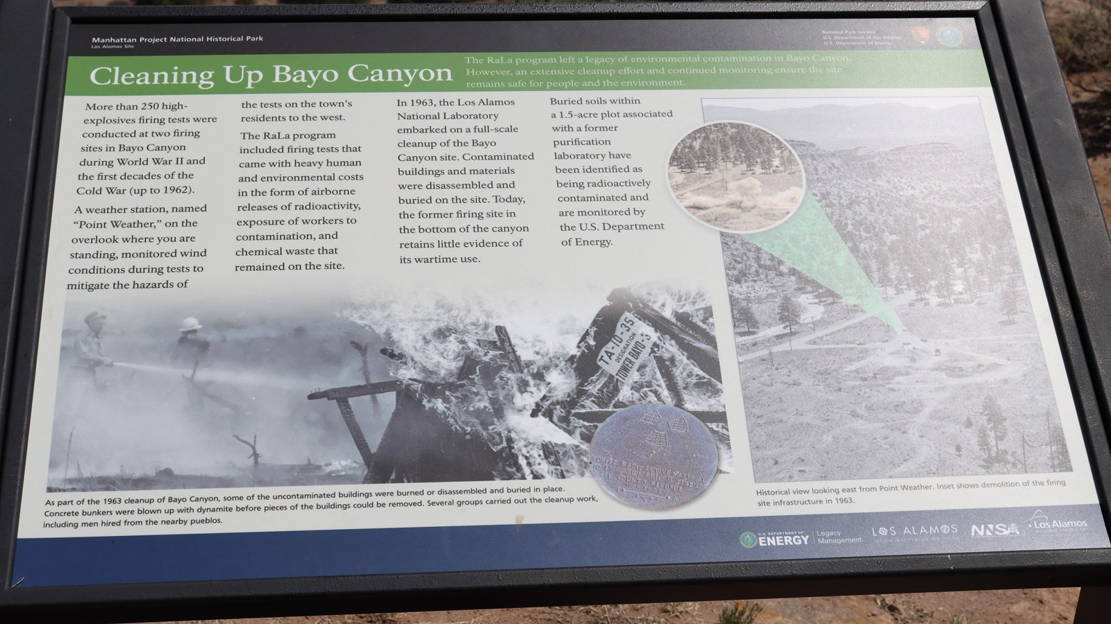 A sign along the trail, titled, “Cleaning Up Bayo Canyon” 