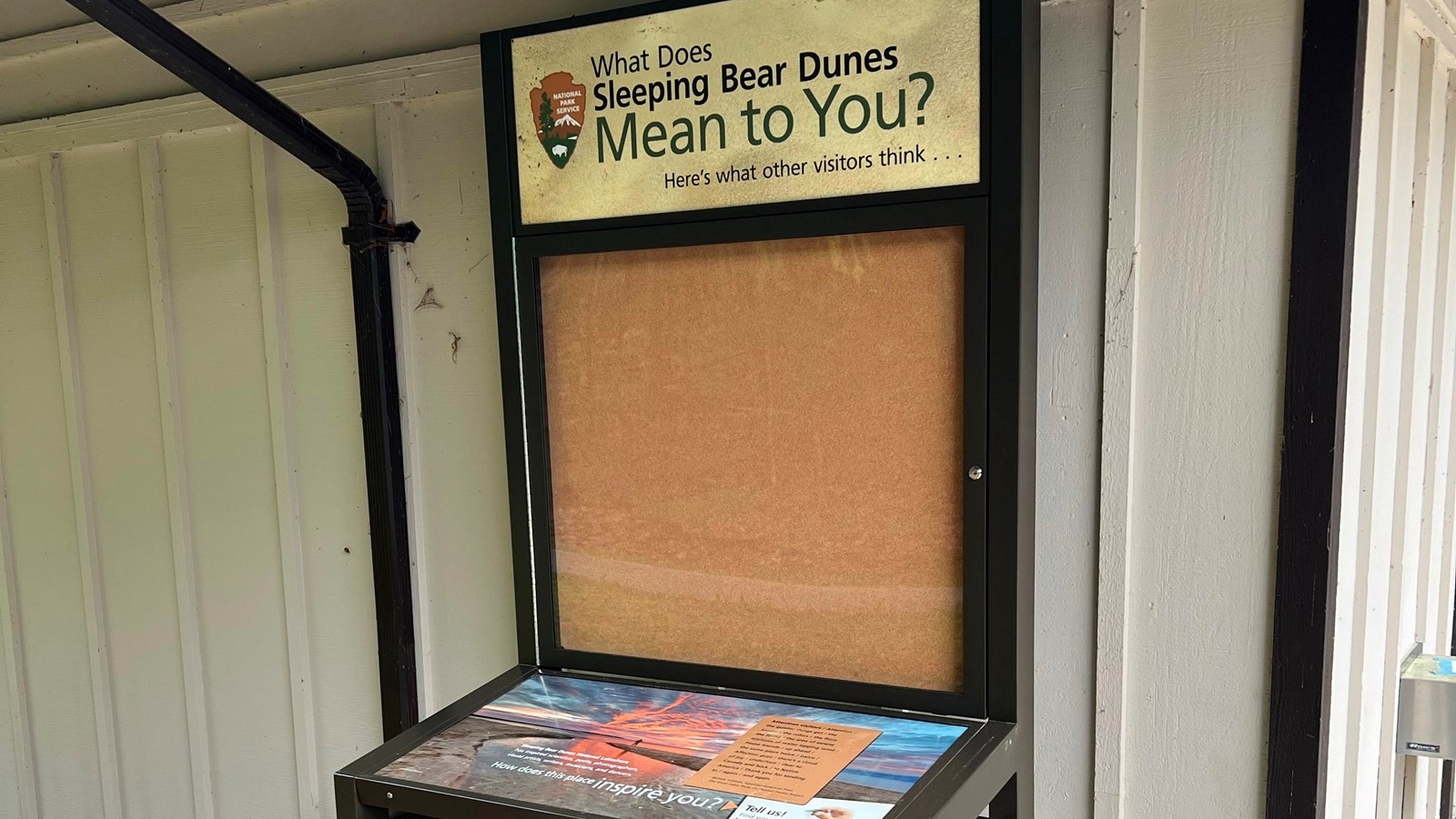 an upright bulletin board. Full audio description in description.