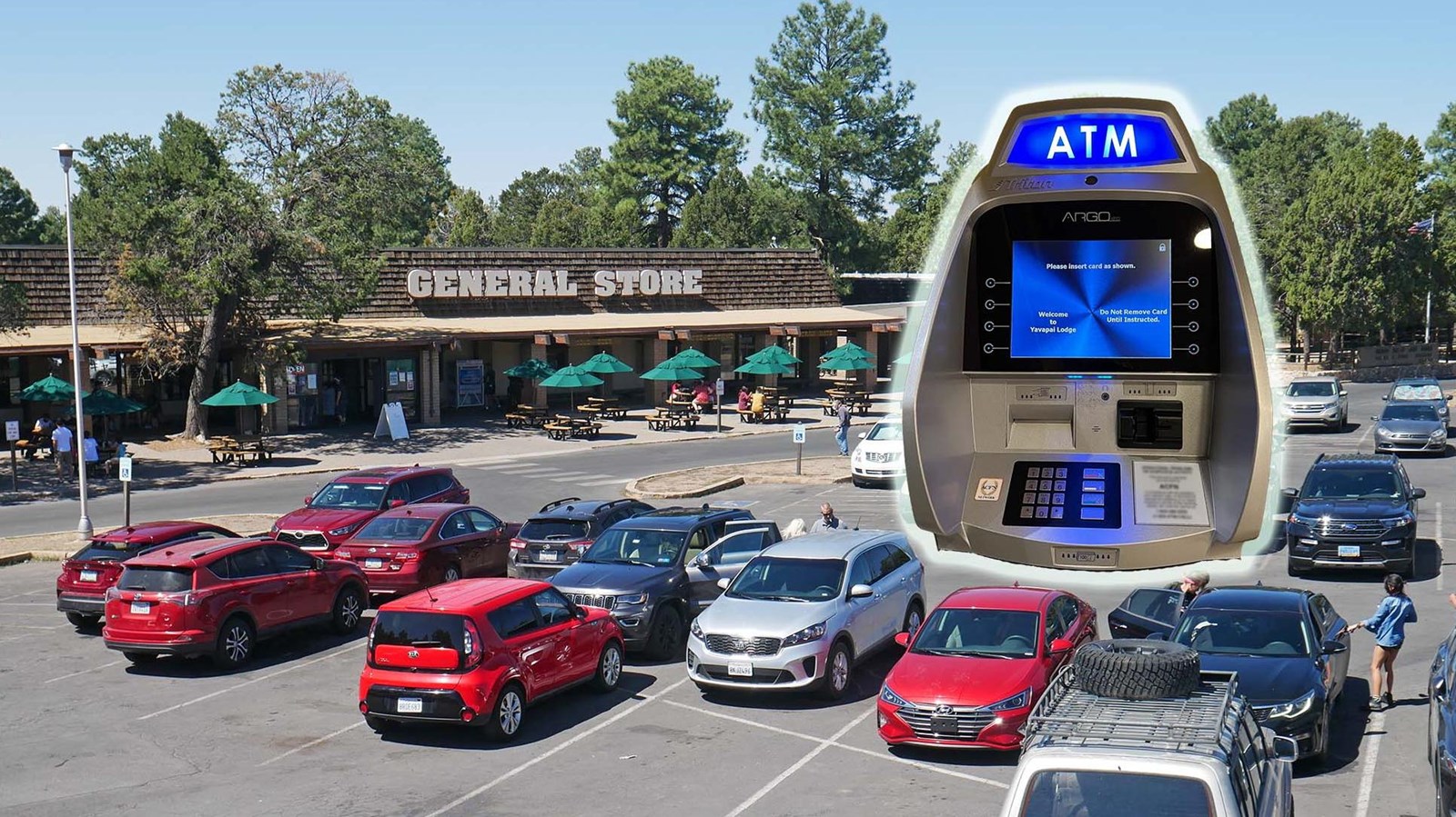 Superimposed ATM above cars in a parking lot with a brown general store building in the background