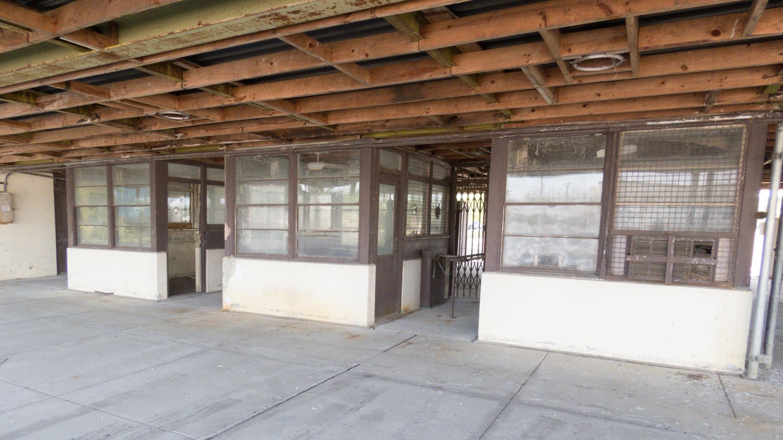 A series of covered gates with turnstiles.