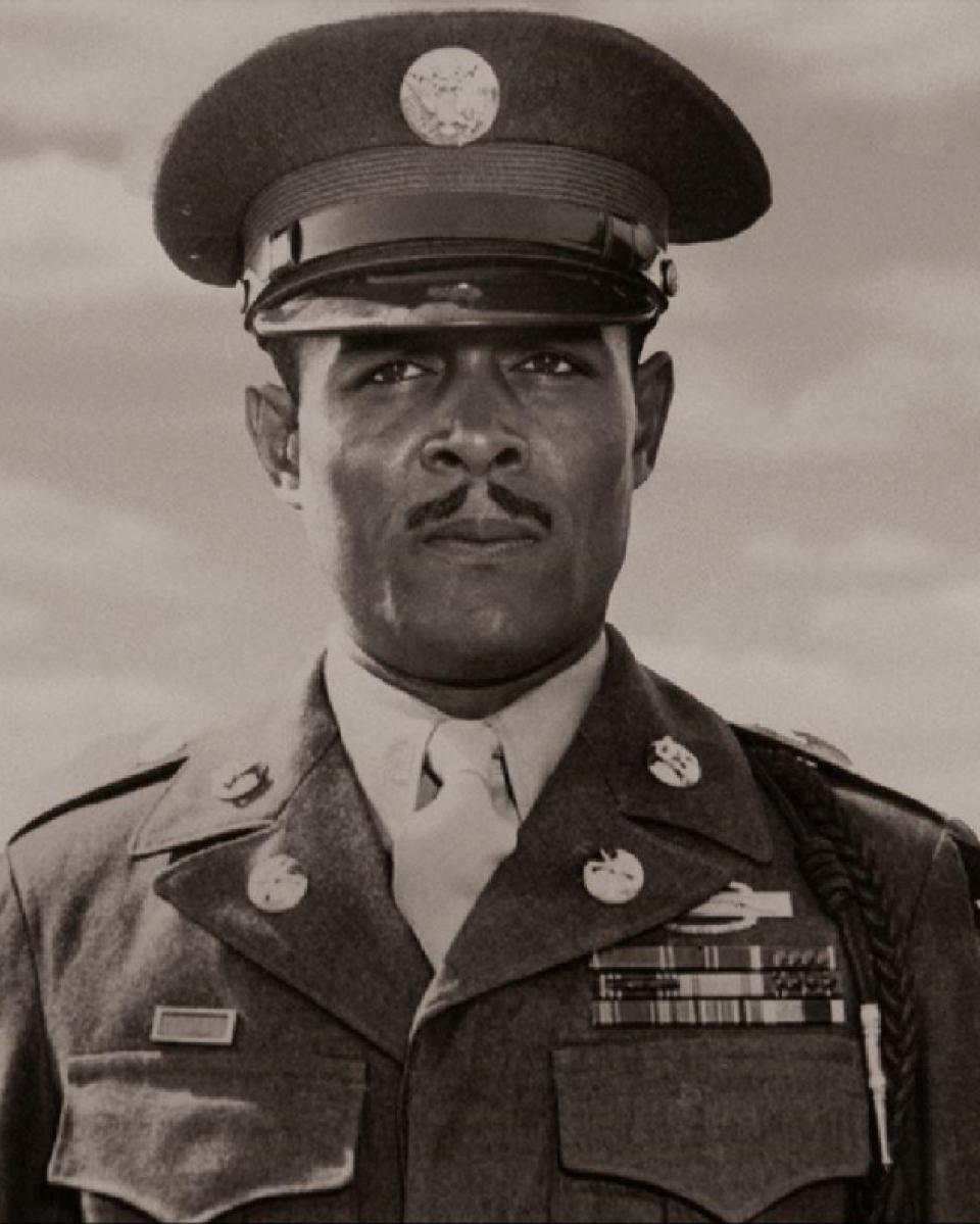 Black and white photo of African American man in World War Two military uniform