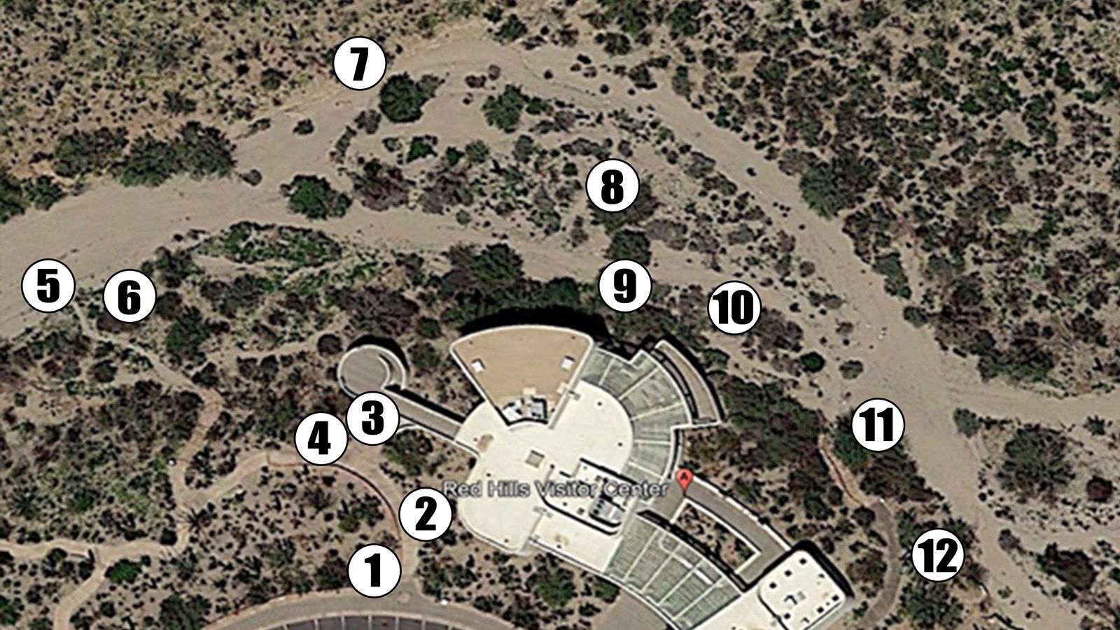 Aerial image shows numbers 1 - 12 in clockwise order around the Redhills VC, starting in lower left.