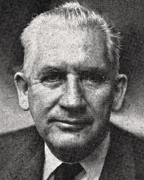 Portrait of Senator Paul H. Douglas, black and white, wearing necktie, suit jacket and white shirt