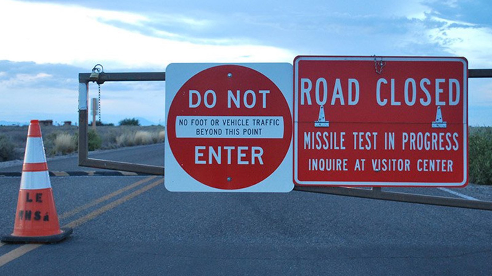 Sign for park closures and missile test in progress.