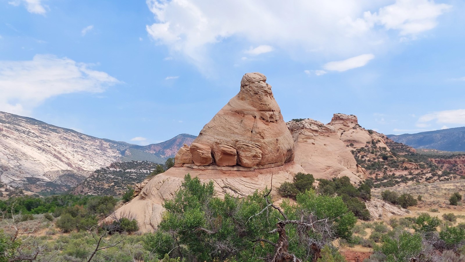 A large sandstone butte that resembles the shape of an elephant\'s foot.