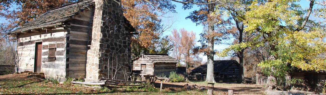 1820s farm site with log cabin, smokehouse, barn and carpenter shop