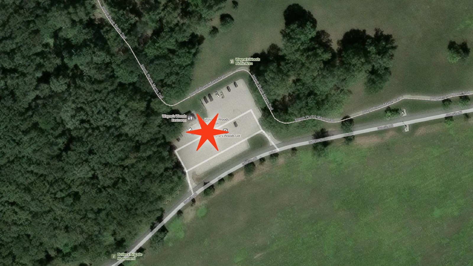 Aerial photo of Waynes Woods area with red star in the parking lot next to restroom