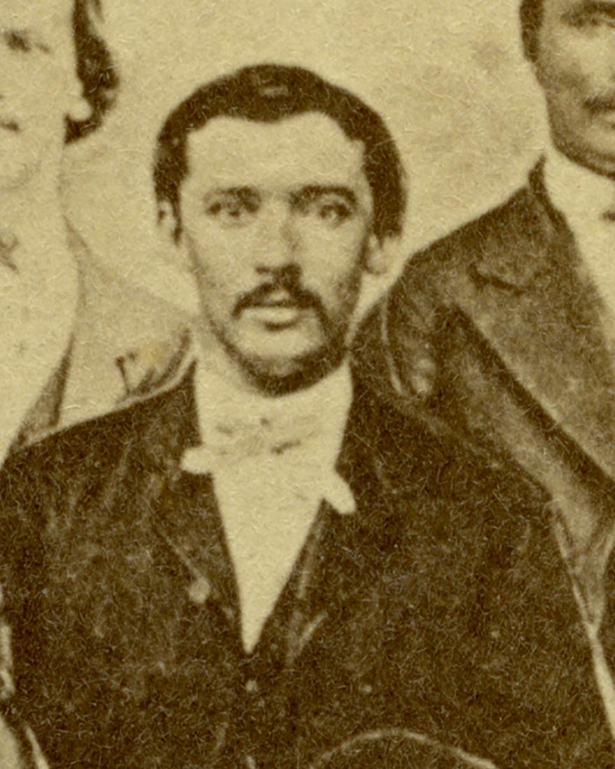An African American man in a suit and bowtie in the 1870s.