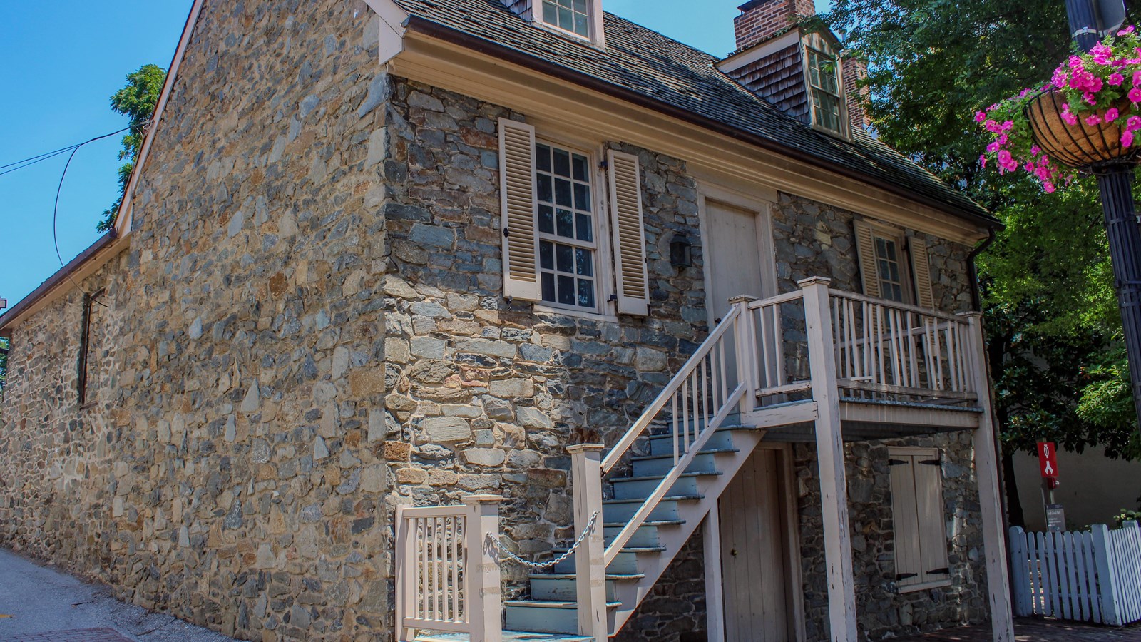 a 1700s two-story stone building 