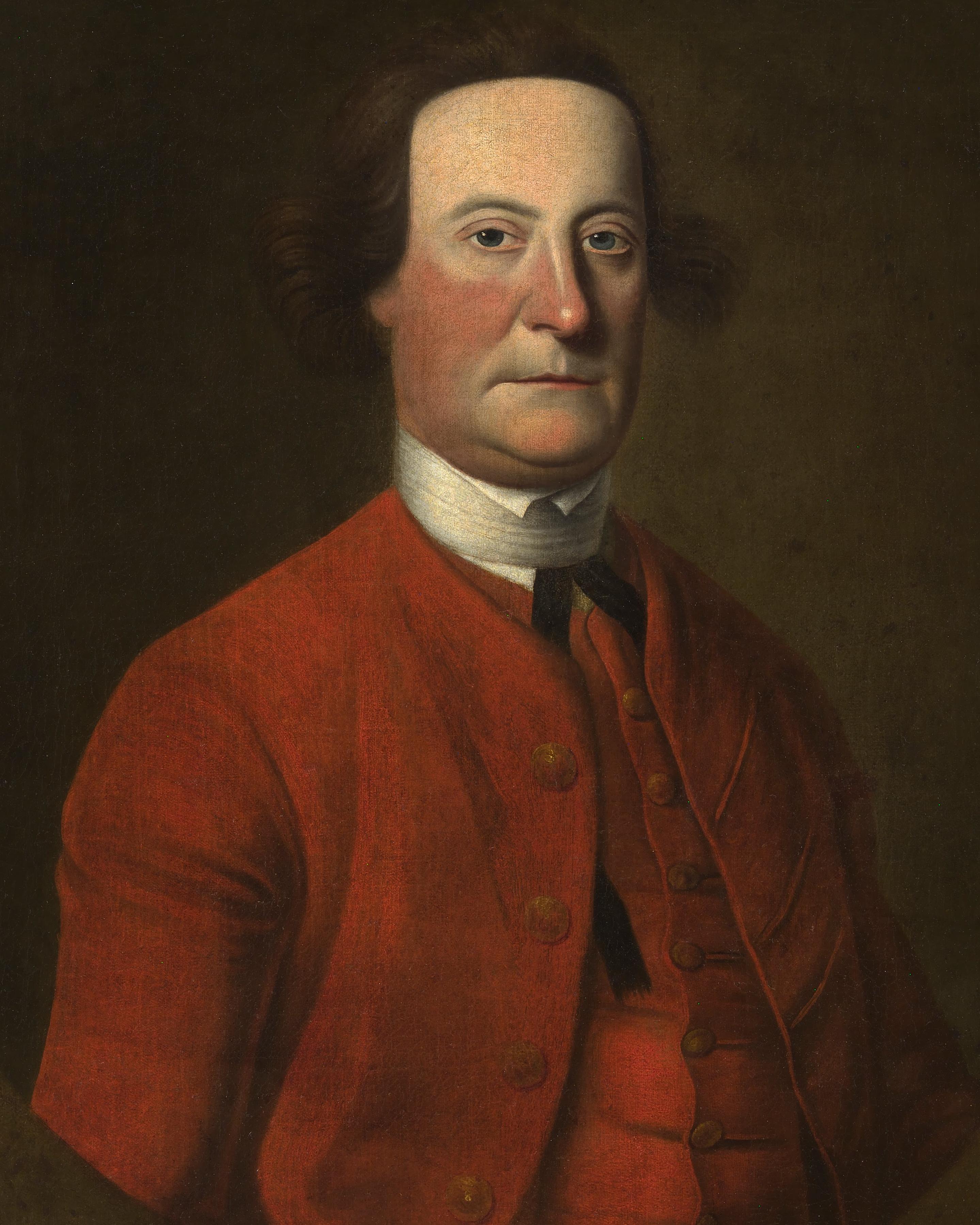 A man with a thin face and un-powdered, close cropped hair poses in a portait.