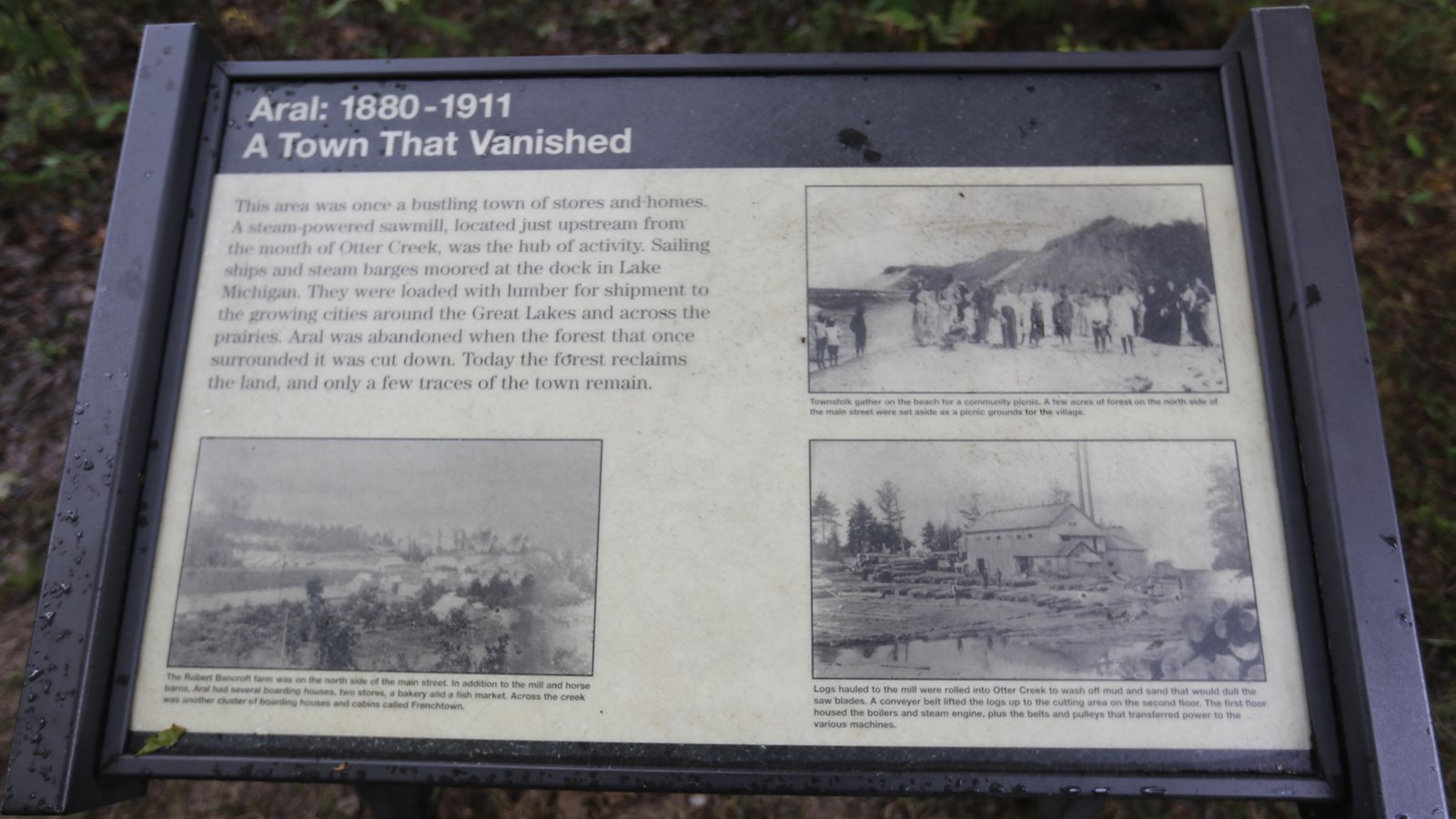 Aral history wayside with three historic photos