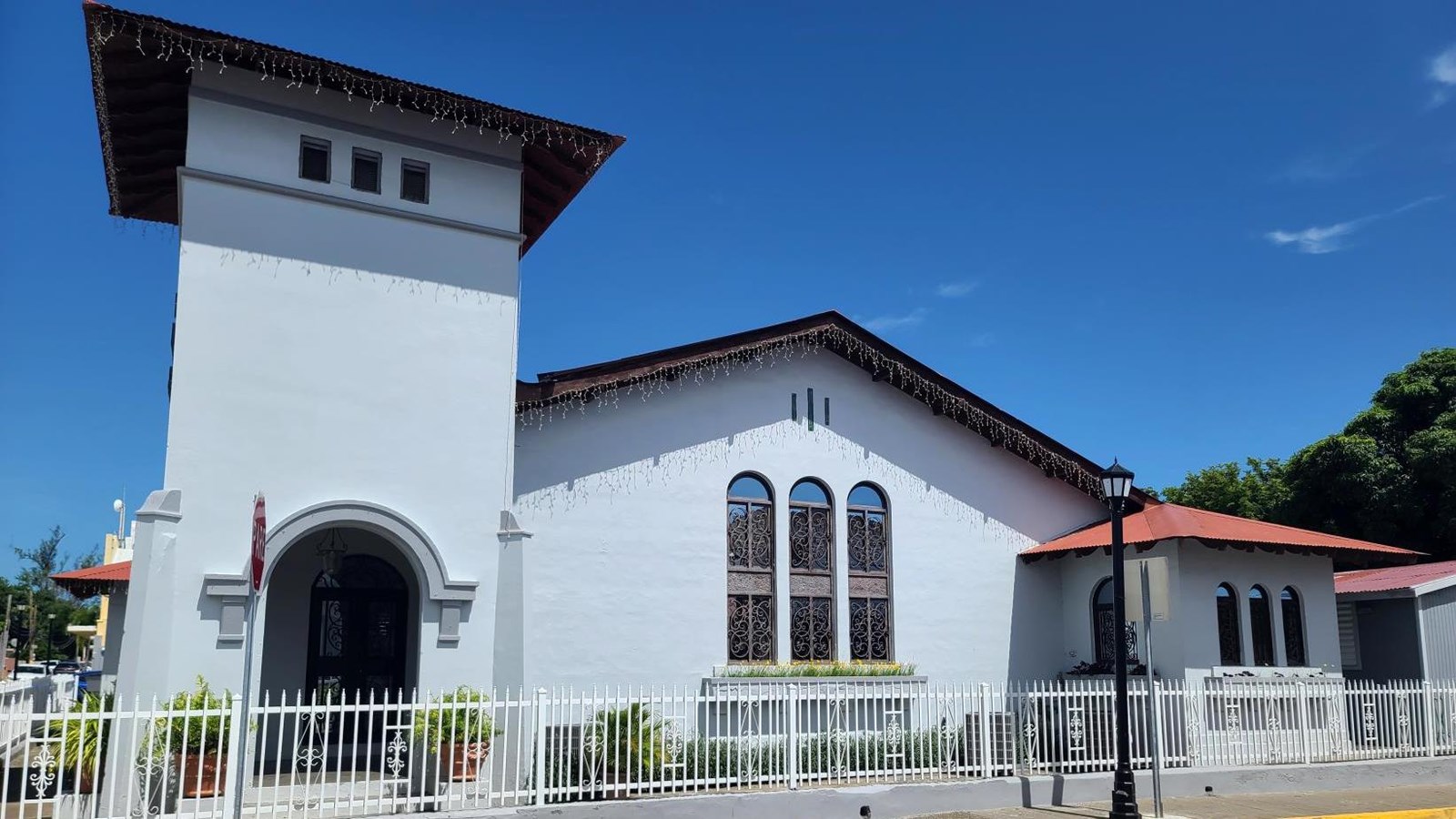 One story church with bell tower. 