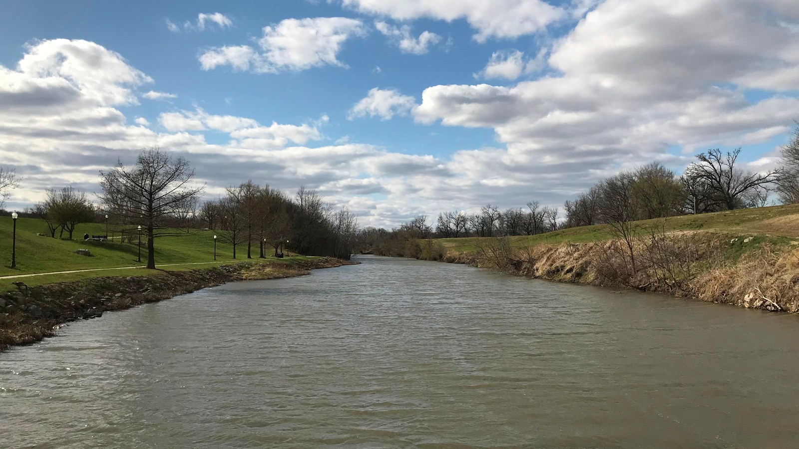 A broad river with developed recreation on the banks.