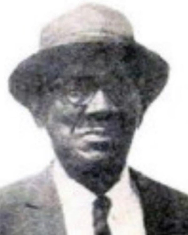 B&W portrait images from newspaper of black man in a fedora and suit and tie