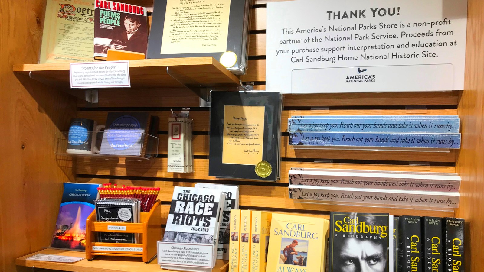 image of a bookshelf with retails items displayed including books and postcards