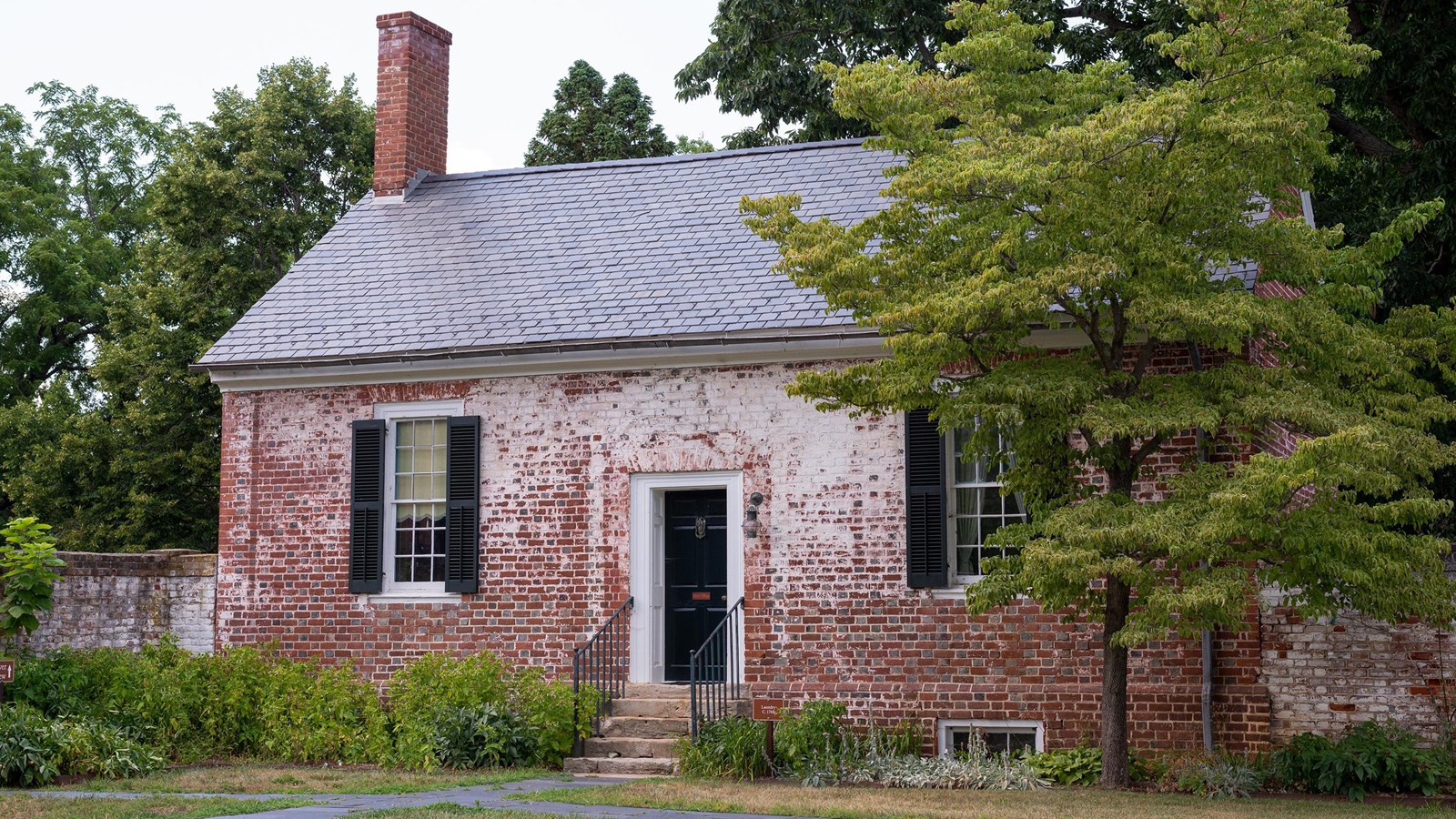 A single story, two room brick building.