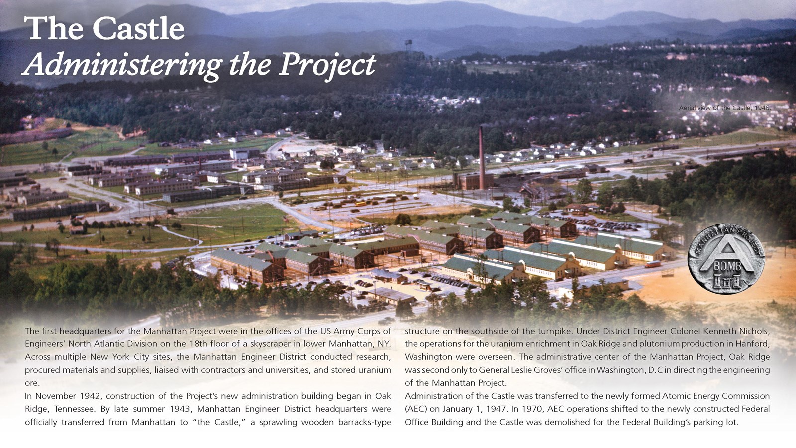 A wayside exhibit with text and a color photo of administration buildings in Oak Ridge, TN.