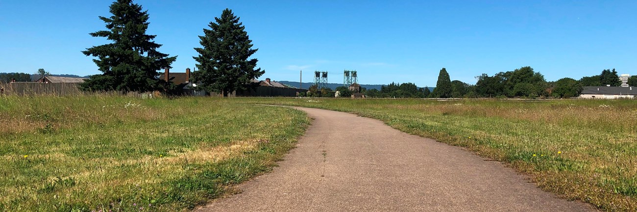 A paved trail on a sunny day