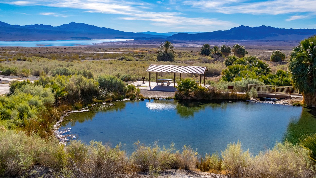 A picnic shelter next to a hot spring