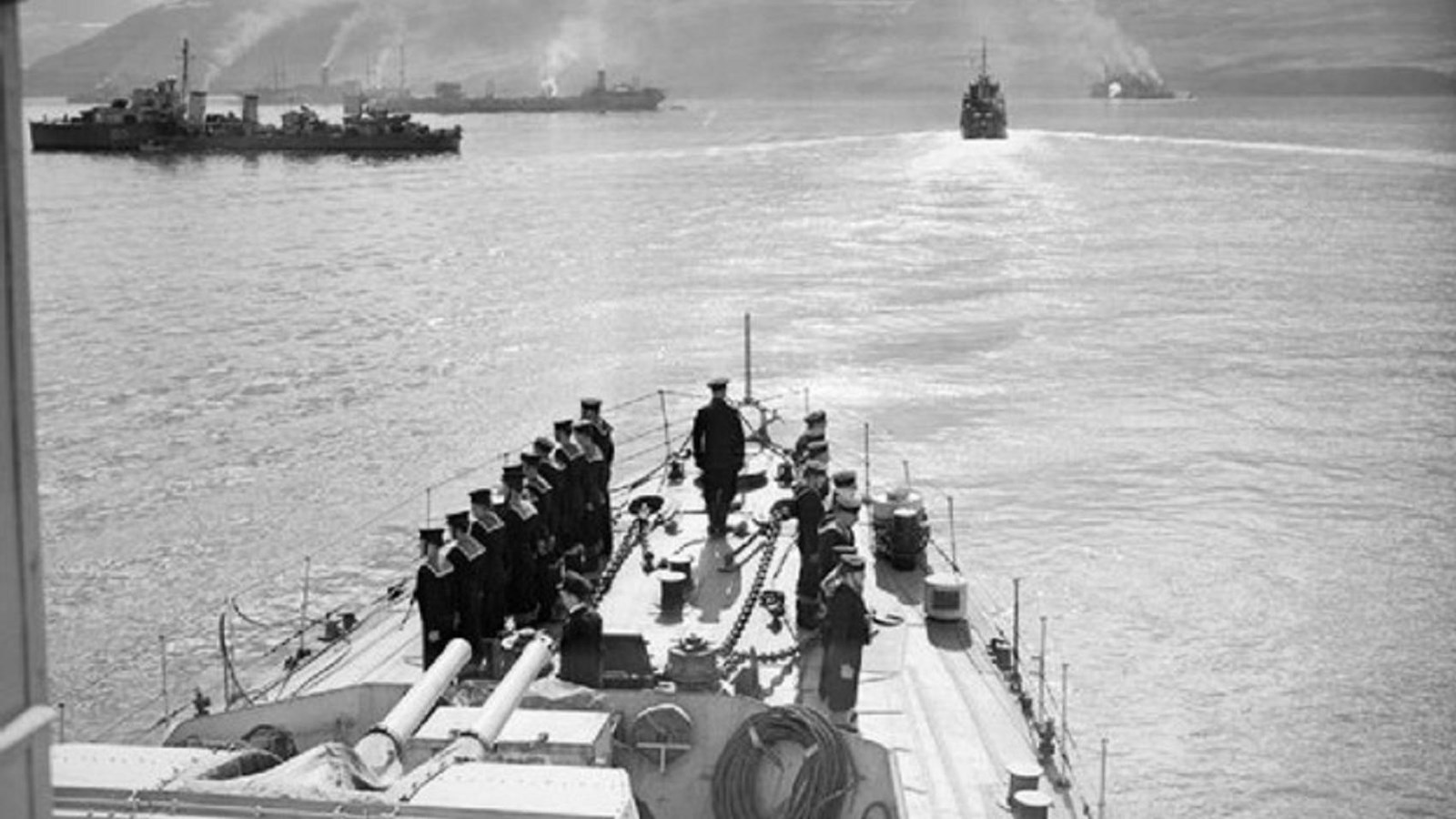 Ships being escorted in the open water