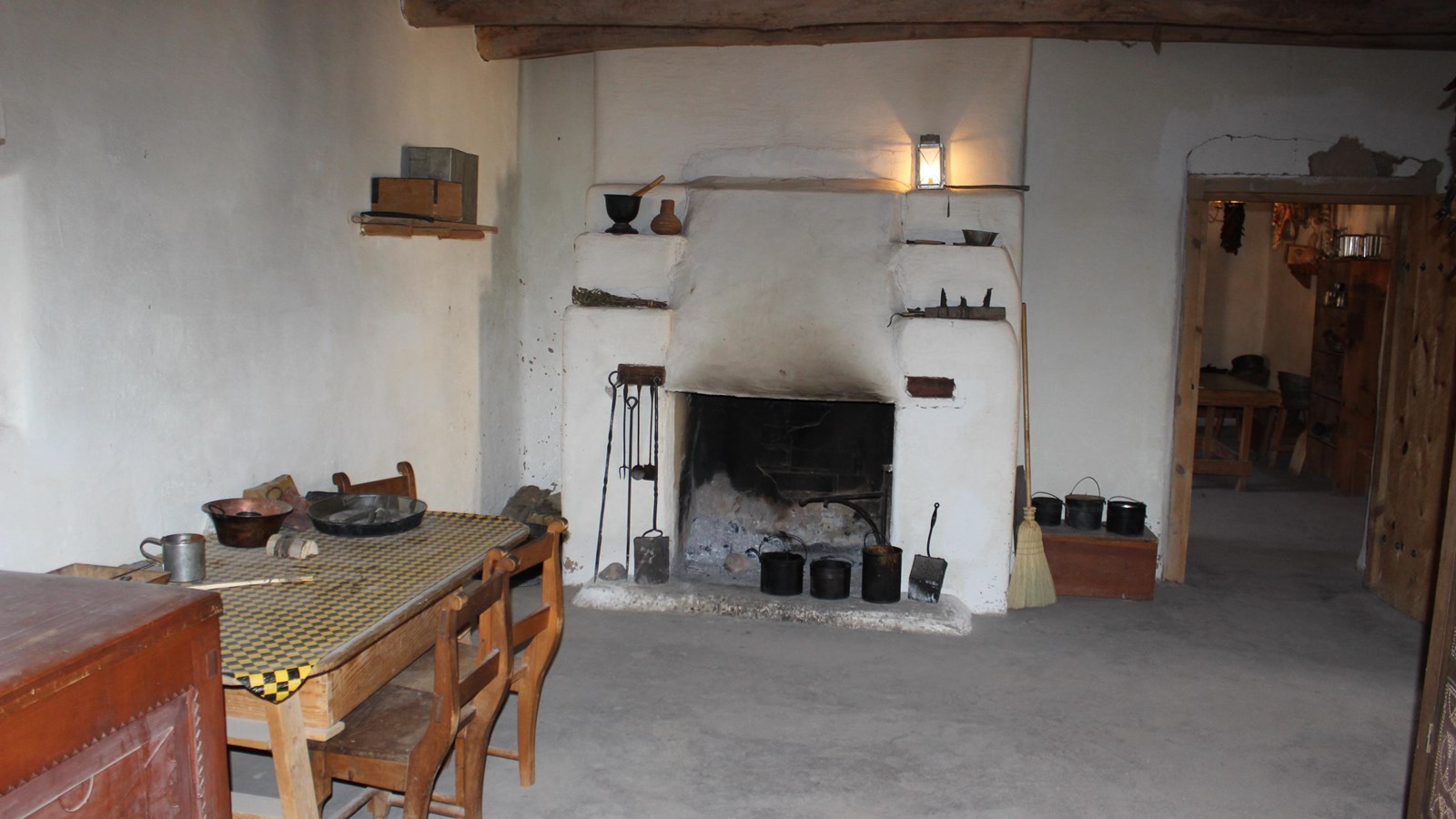 A room with whitewashed walls