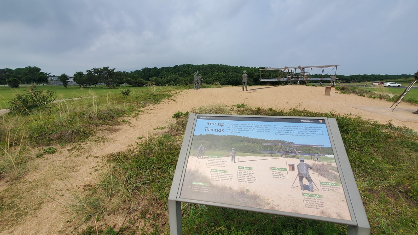 Colored photograph of the view from the wayside with the sculpture in the background