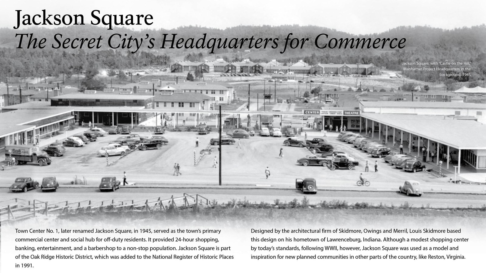 A wayside with text and an elevated image of a shopping center.