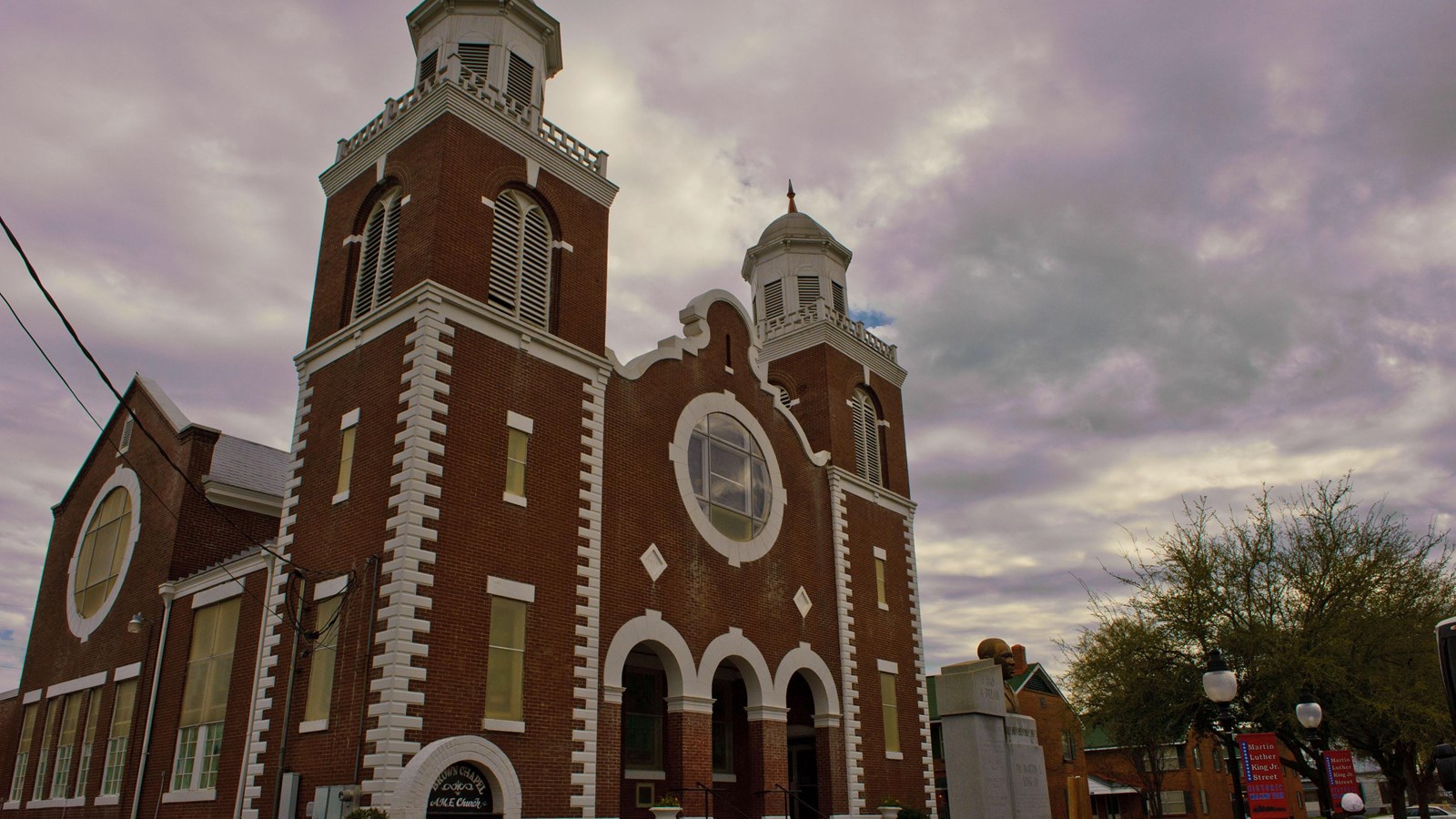 Brick church with two spires. CC0