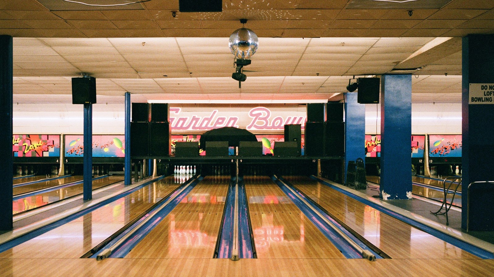 Several bowling alleys with neon 