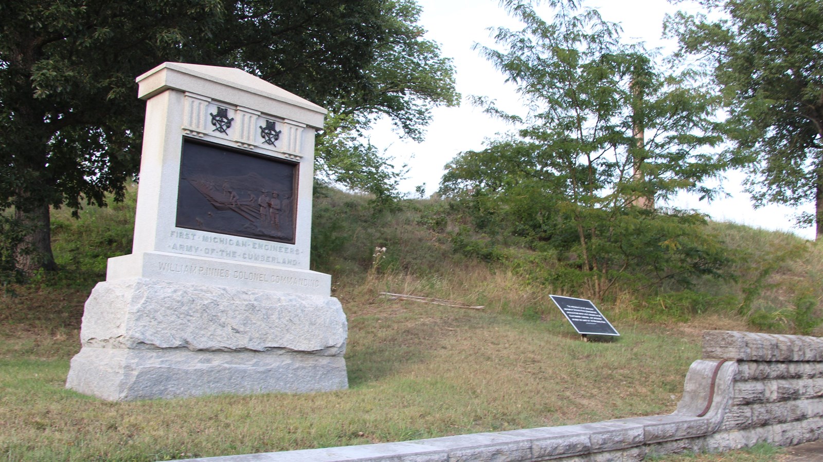 The bas-relief on the monument shows engineers bridging the Tennessee River during the campaign.
