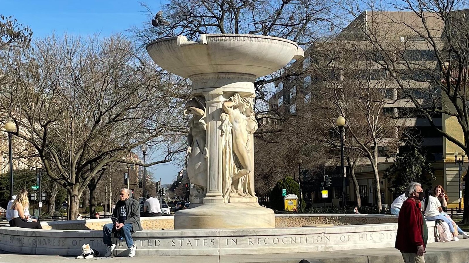 A large fountain in a city park
