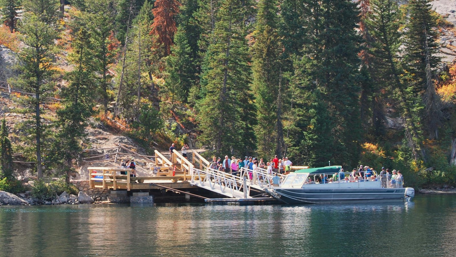Passengers loading the Jenny Lake Shuttle Boat at the West Shore Boat Dock.