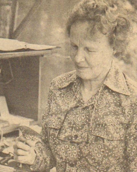 Barbara Patterson, with bird sitting on the top of her hand. 