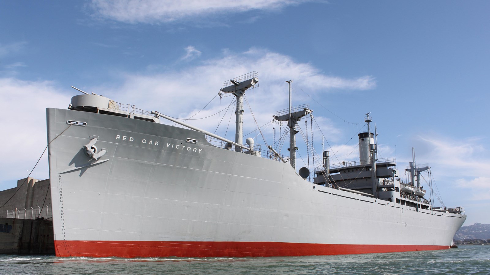 The historic SS Red Oak Victory Ship is tied to the dock. 