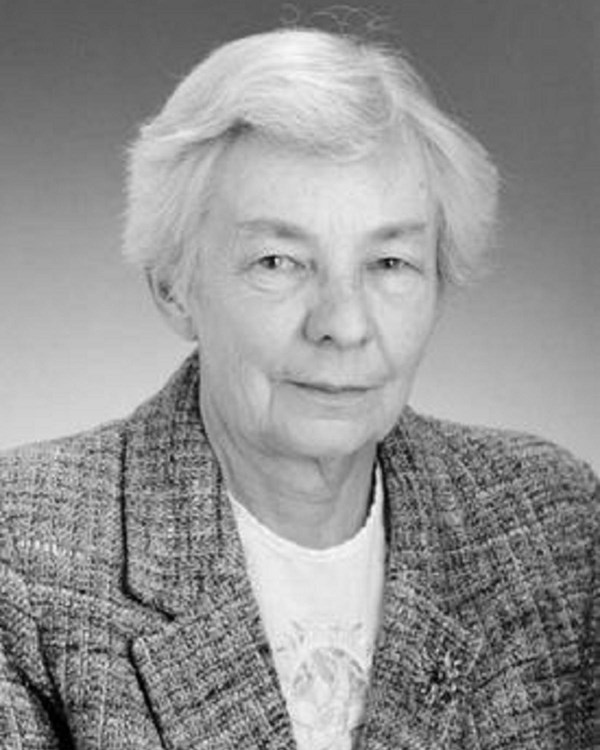 Black and white portrait of a white woman with short gray hair