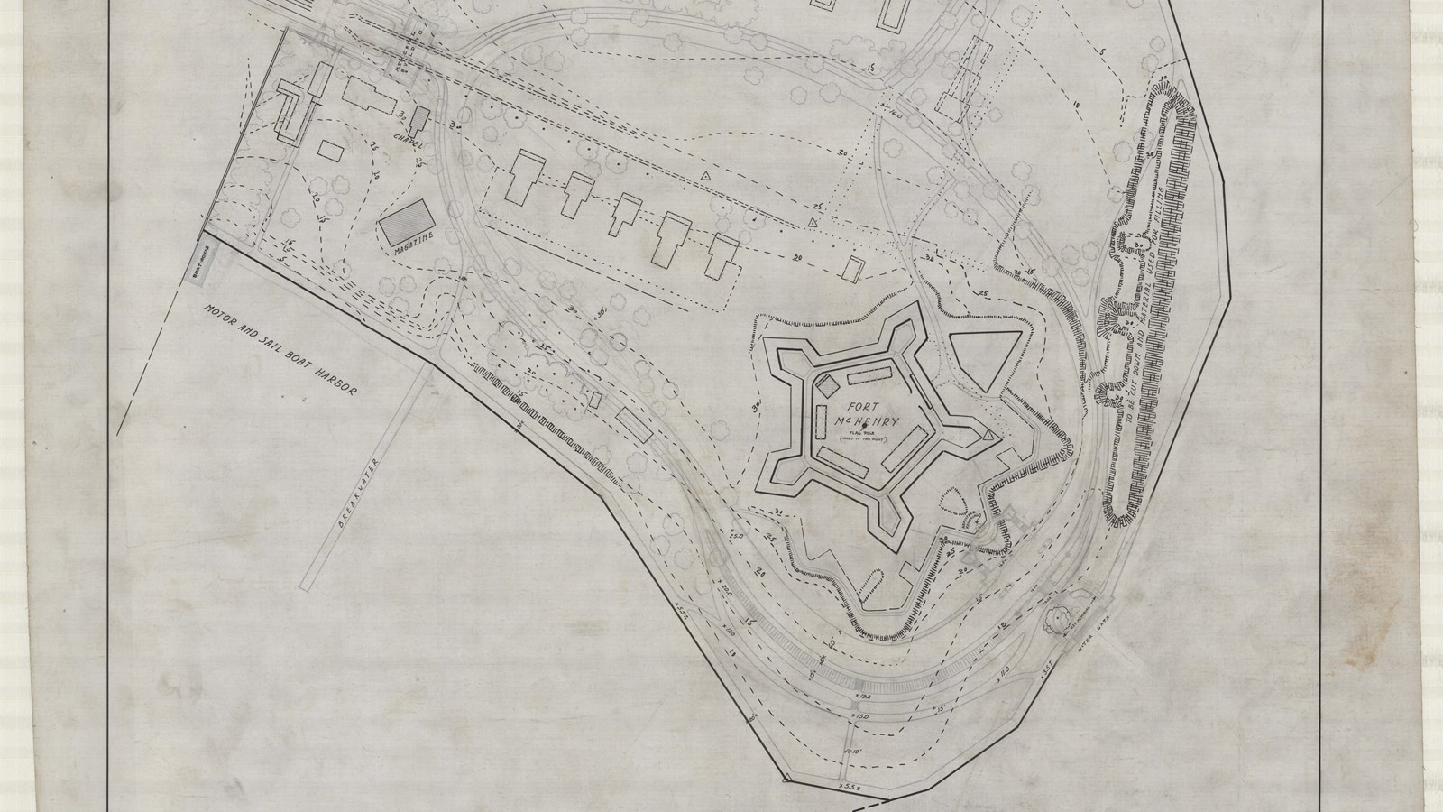 Pencil plan of triangular building on grassy area with some trees and other buildings around