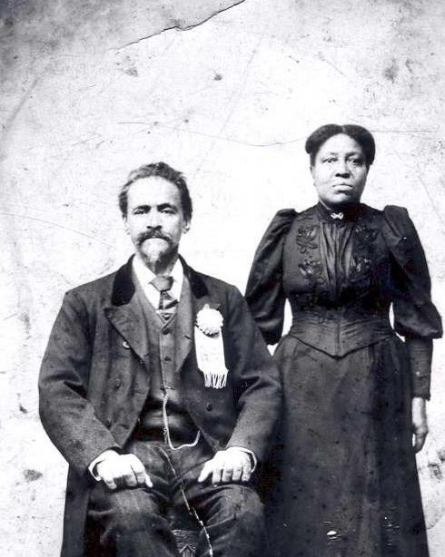 Image of an African American couple in 19th century dress.