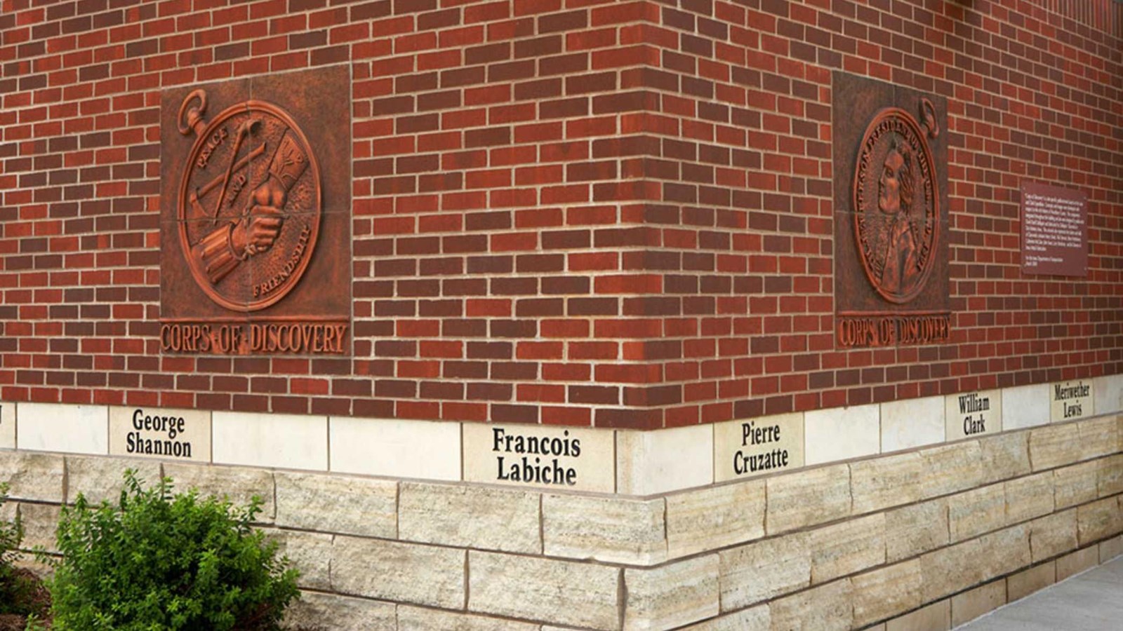 brick wall with names and likeness