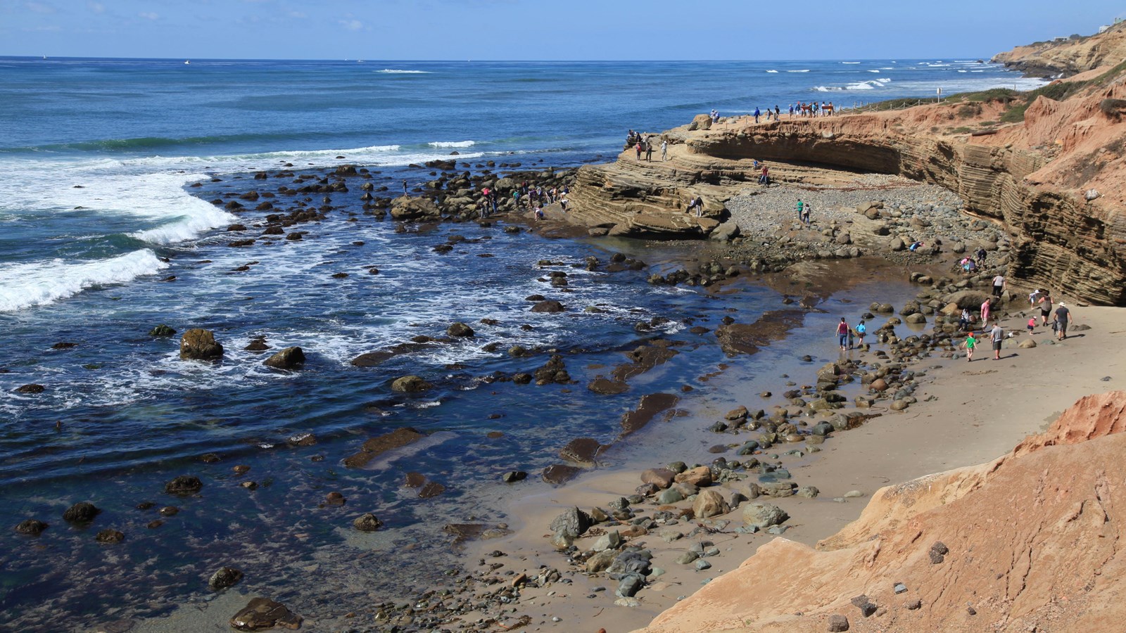A rocky beach along side the Pacific ocean