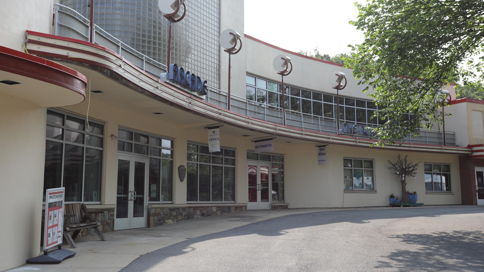 A long row of storefronts that used to be carnival stalls.