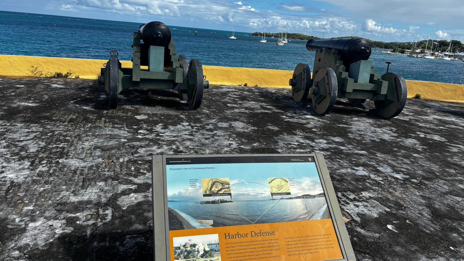 Photo of cannon looking out over the harbor.