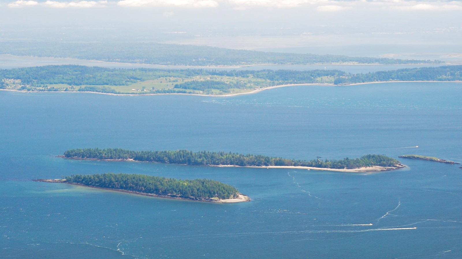 A view of two islands in the water from above